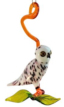 Hängevogel, Schneeeule auf Ast
